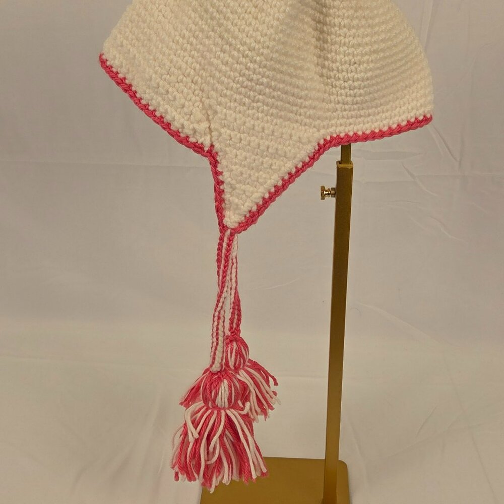 Vintage Handmade crochet baby/toddler hat – cream with pink trim and tassels.